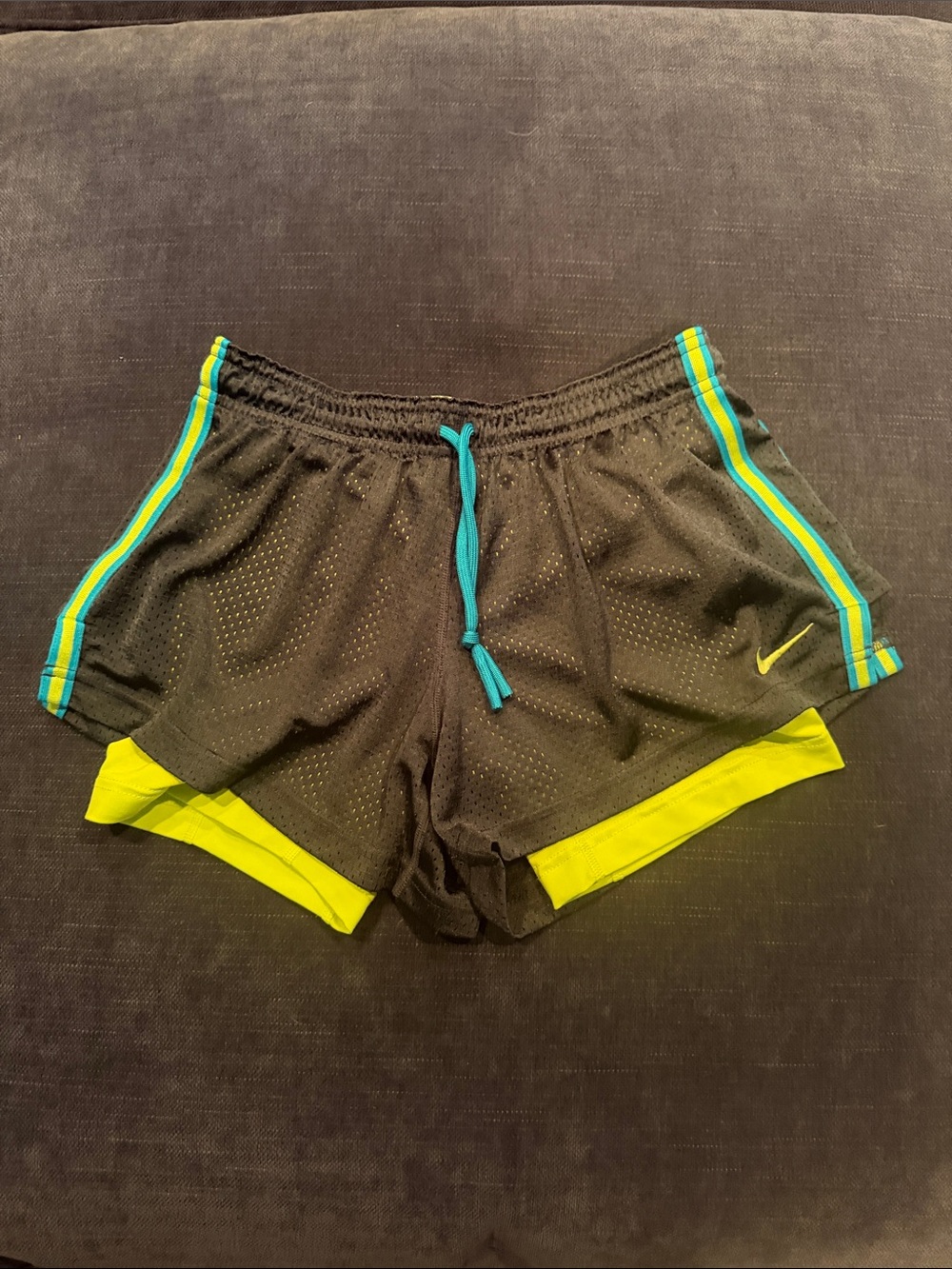 Nike Women’s Black Athletic Shorts with Teal & Neon Yellow Accents